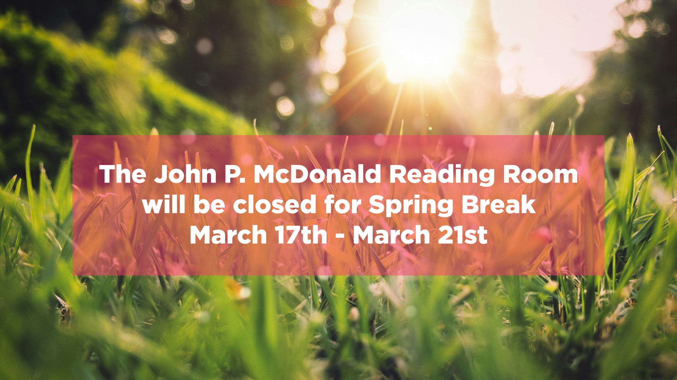 Photo of a spring field at sunset. "The John P. McDonald Reading Room will be closed for spring break March 17 - 21st."